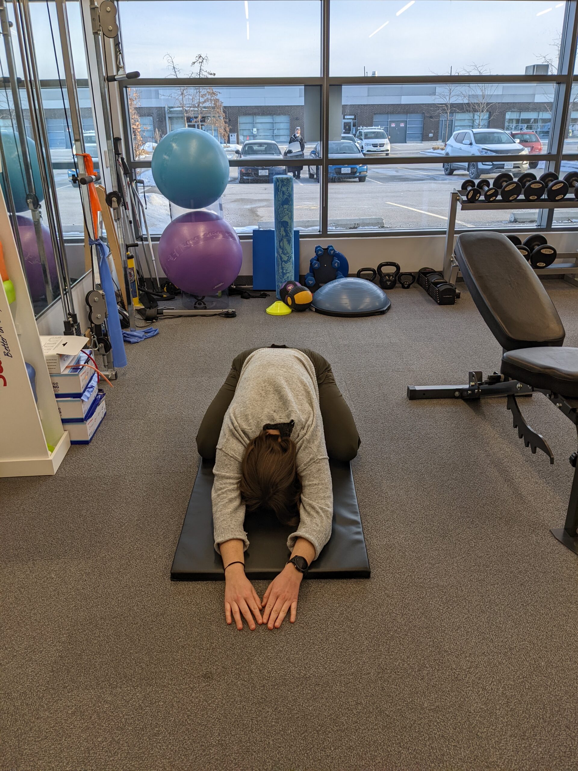 Child's Pose demonstrated by Dr Rachel Goldsworthy