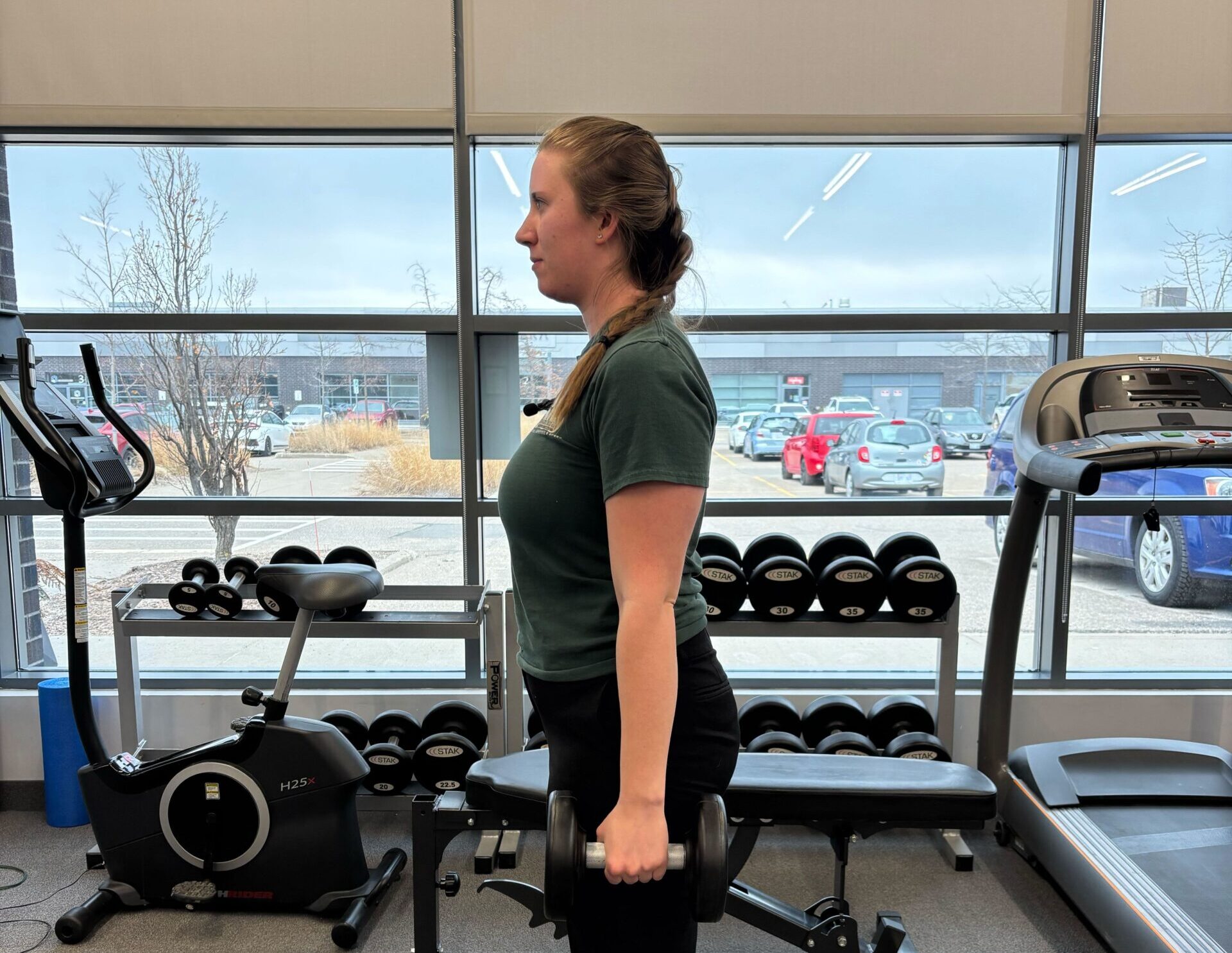 Physiotherapist Amanda Calford demonstrating Shoulder Shrug Exercise