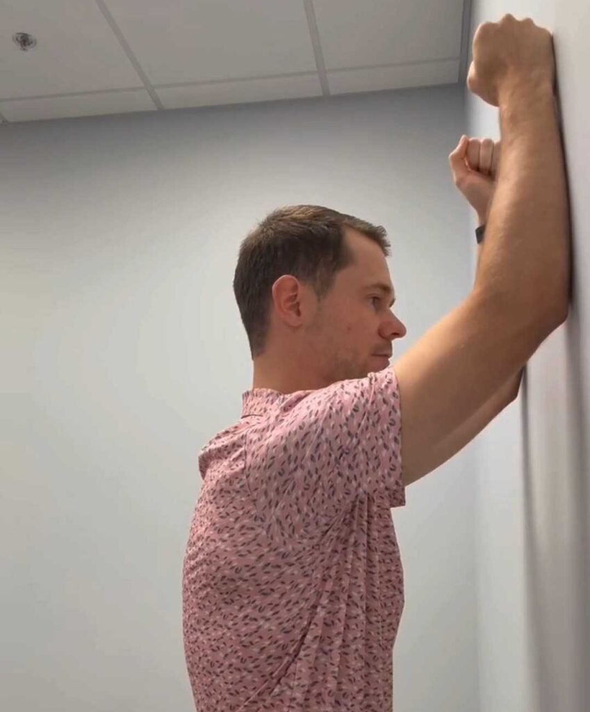 Wall Slide Shoulder Blade Exercise demonstrated by Physiotherapist Coulton Roe