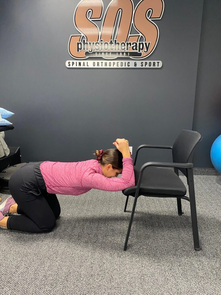 Upper Back Stretch demonstrated by physiotherapist Courtney Voisin