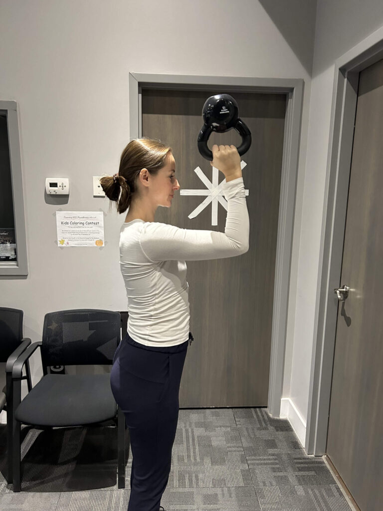 Waiters' Carry Exercise demonstrated by physiotherapist Lindsey Mortimer