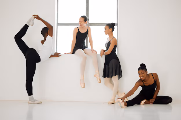 Group of dancers stretching at class