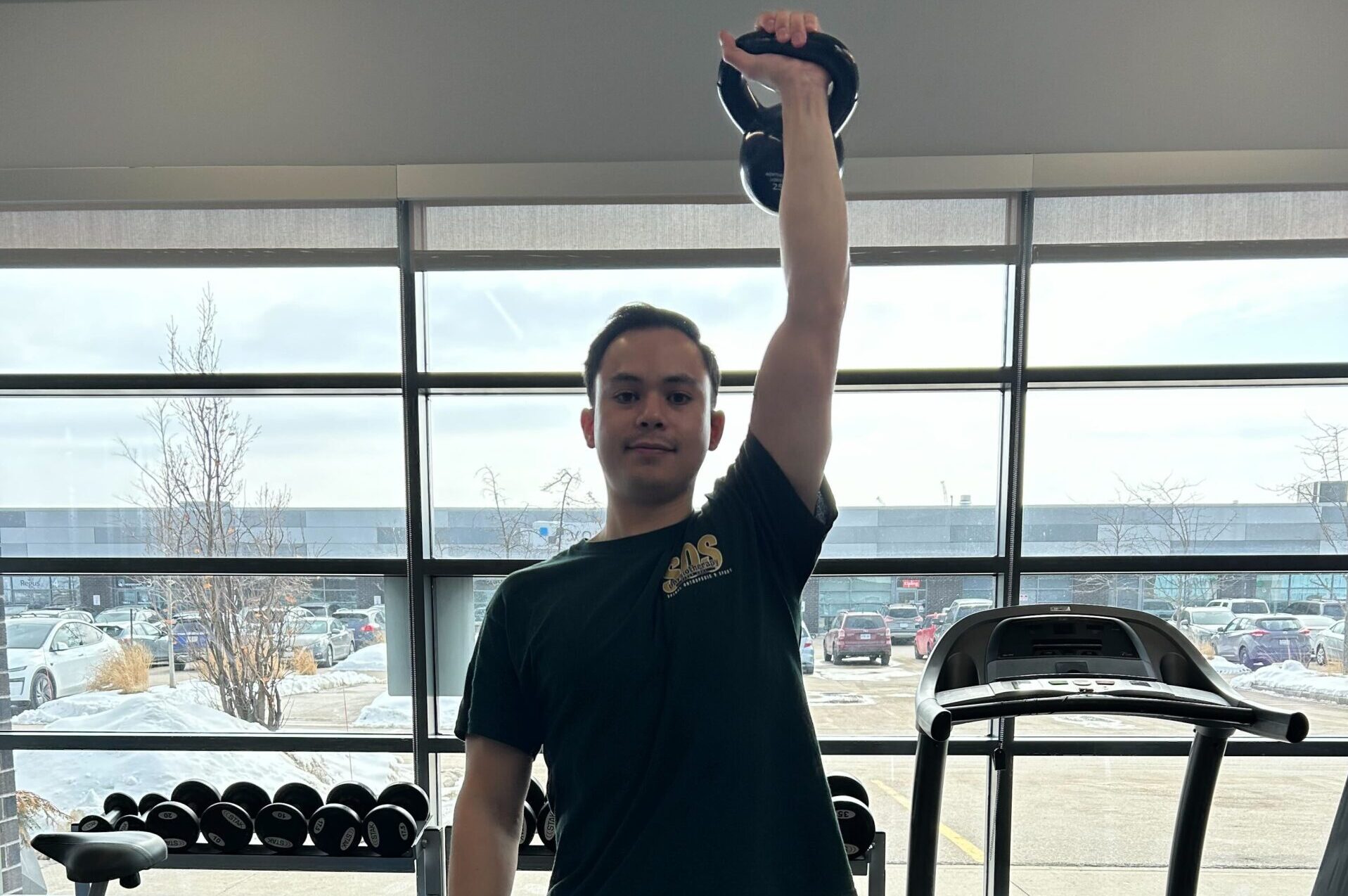 Kettlebell Overhead Carry Exercise by Physiotherapist Adam Hanton-Fong