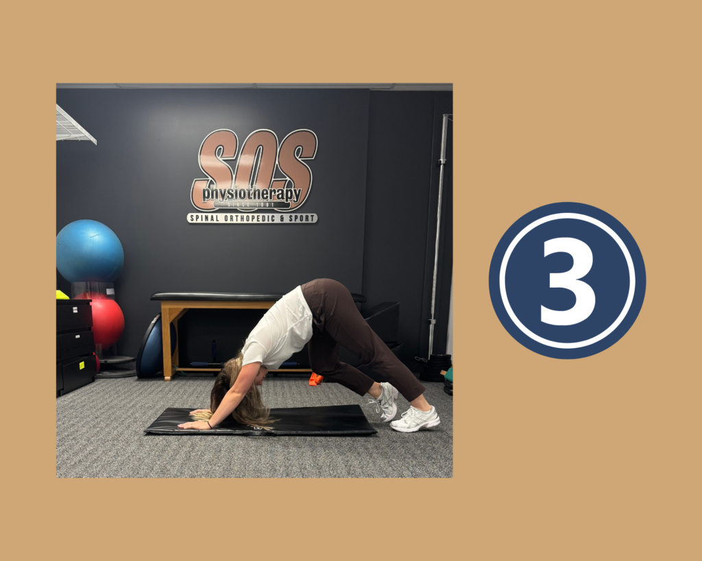 Step 3 of Downward Dog with Calf Extensions Stretch by physiotherapist Anna Pelczar